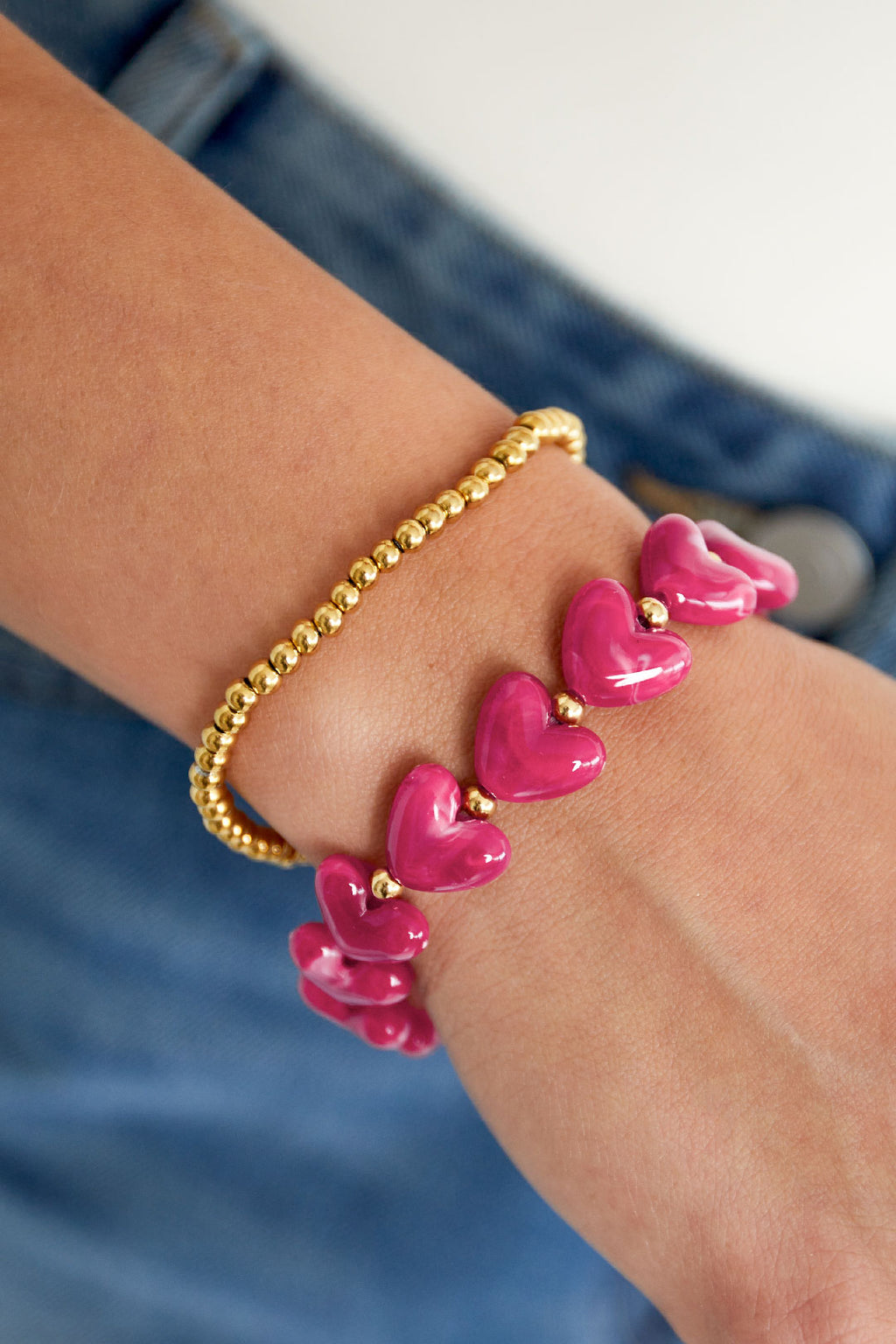 Bracciale elastico con perline a forma di cuore